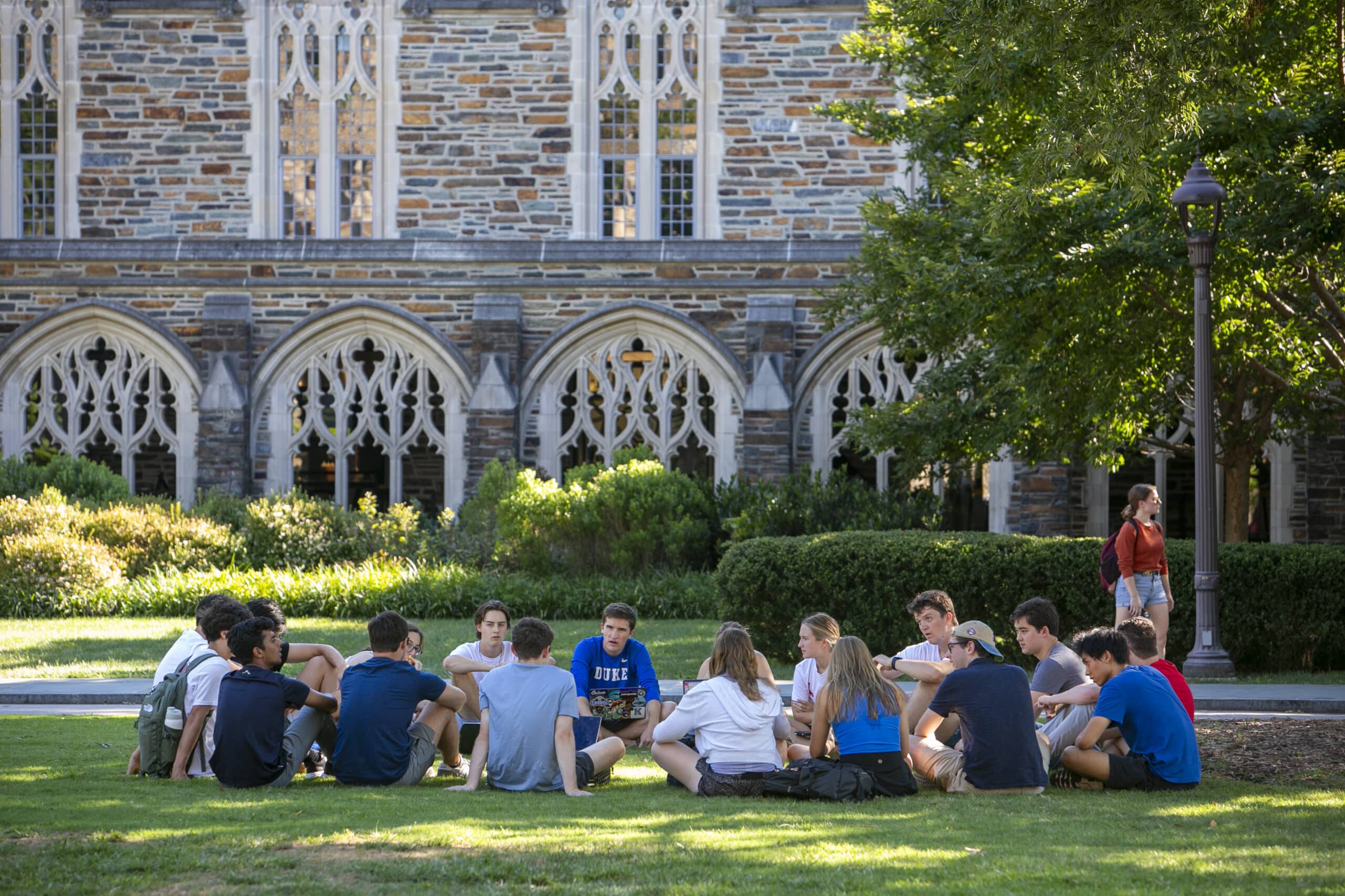 The Duke Chronicle sports department meets near their office on the Abele Quad on Duke’s West Campus during a beautiful Fall afternoon. The Brodhead Center is in the background.