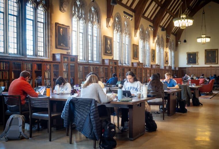 Studying in the Gothic Reading Room. Students find favorite study spots around West Campus during finals week.