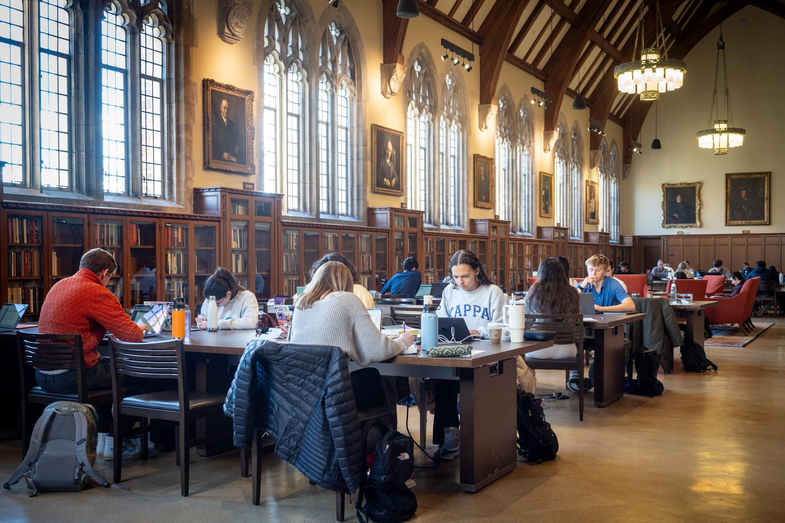 Studying in the Gothic Reading Room. Students find favorite study spots around West Campus during finals week.