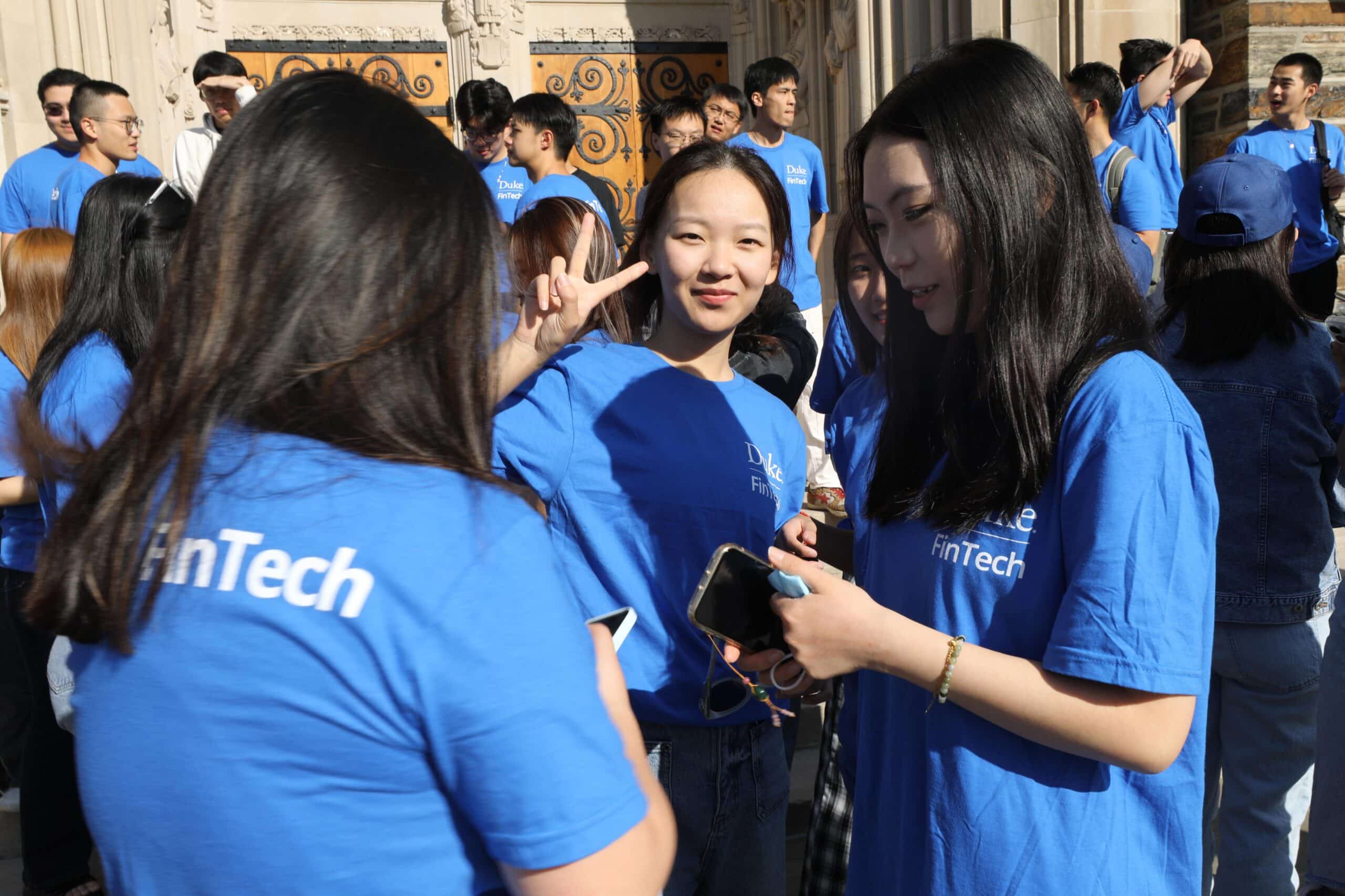 MEng in Financial Technology (FinTech) graduate students and program leadership gather for a class photo on a bright August morning during orientation week 2024.